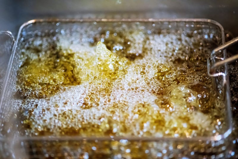 deep-fryers-with-hot-bubbling-boiling-oil-on-resta-2021-08-31-02-35-24-utc-2048x1365